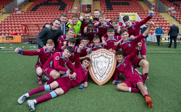 st ninians high school giffnock football team with trophy 768x478